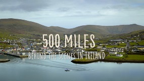 Lake with mountains behind with text '500 Miles behind the scenes in Ireland'  overlayed