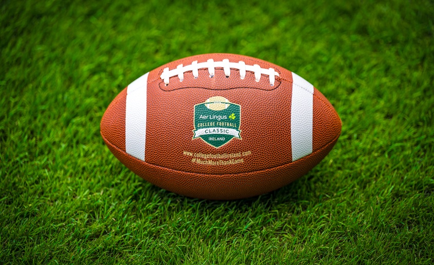 American football with logo with Aer Lingus College Football Classic on it.