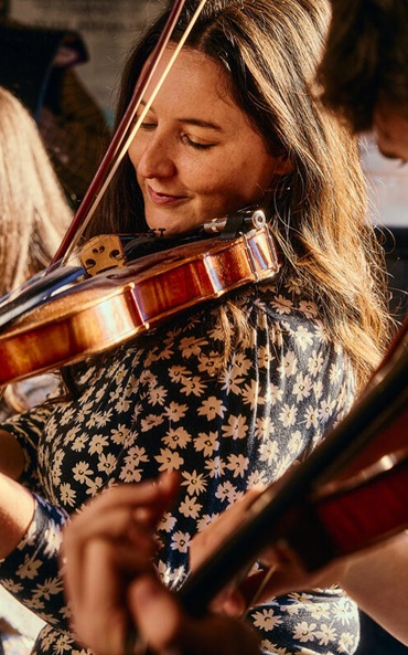 Woman playing the fiddle