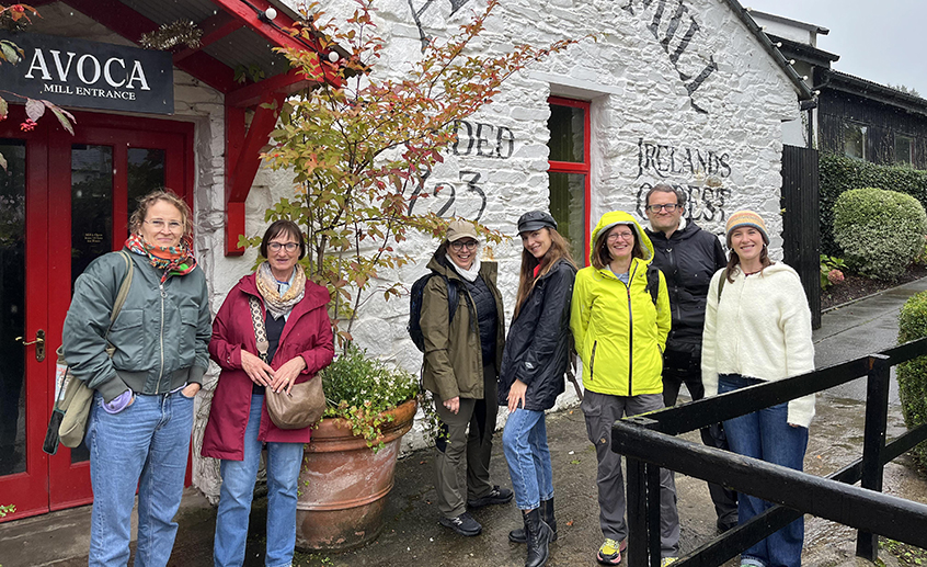 Group of visitors outside Avoca Mill entrance during a craft heritage tour in County Wicklow.
