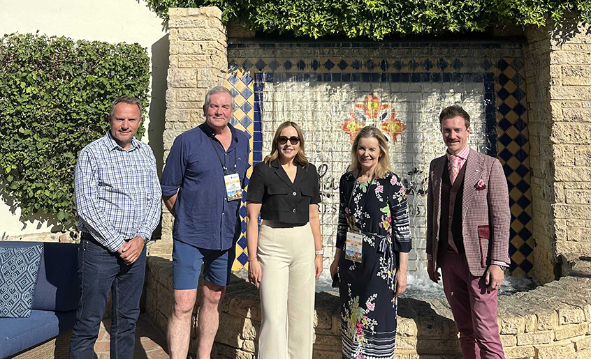 Group shot of five people attending an event