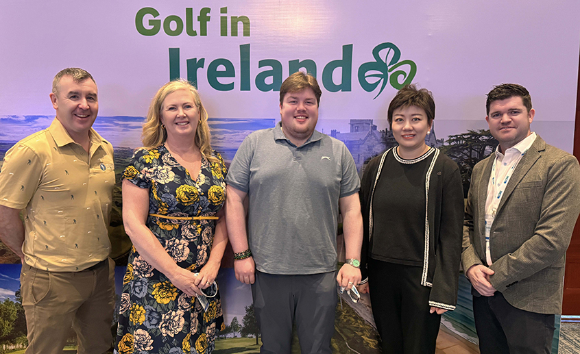 Five people standing in front of a ‘Golf in Ireland’ backdrop.