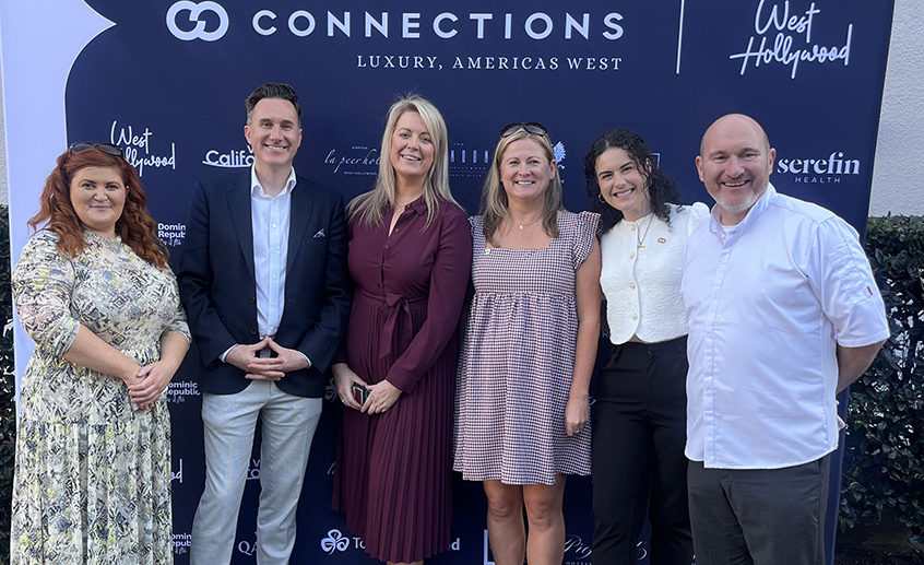 Group of six people standing in front of a backdrop with the text ‘Connections Luxury, Americas West’ and ‘West Hollywood.’