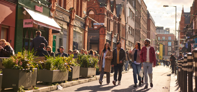 People and shopfronts on Drury Street in Dublin.