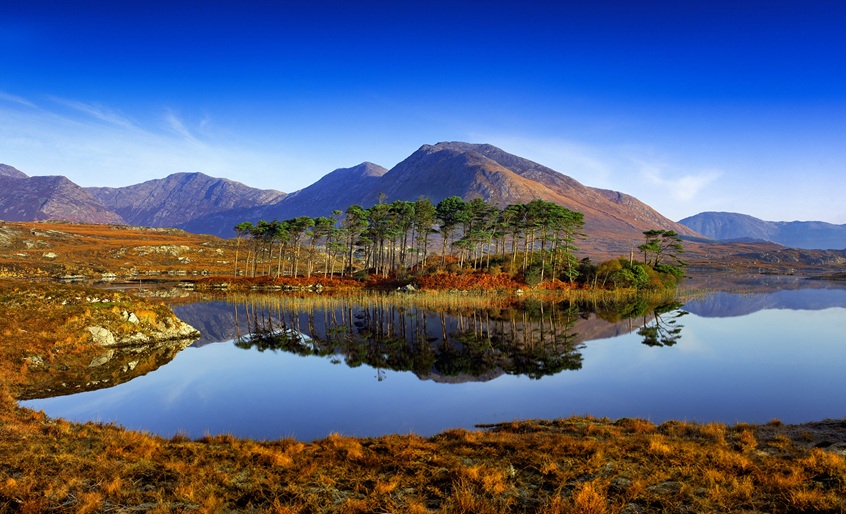 Scenic island, lake and mountain