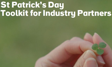 Cover of St Patrick's Day Industry Toolkit, hand holding a shamrock with a green background