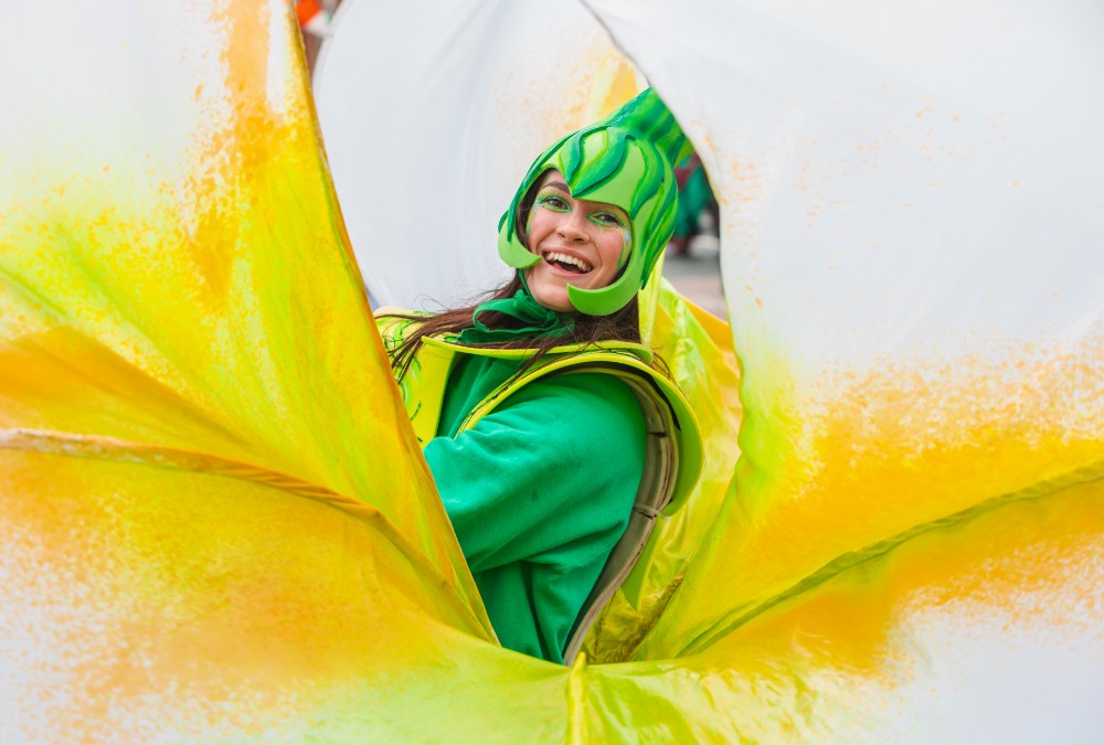 A dancer in a costume for St Patrick's Day