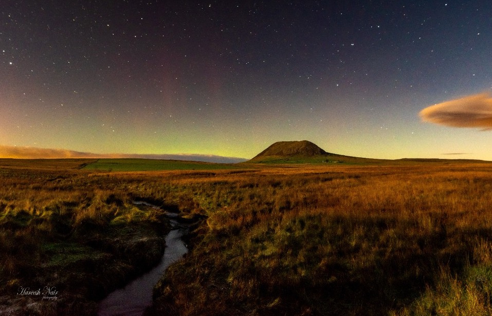 A starry sky over an Irish field