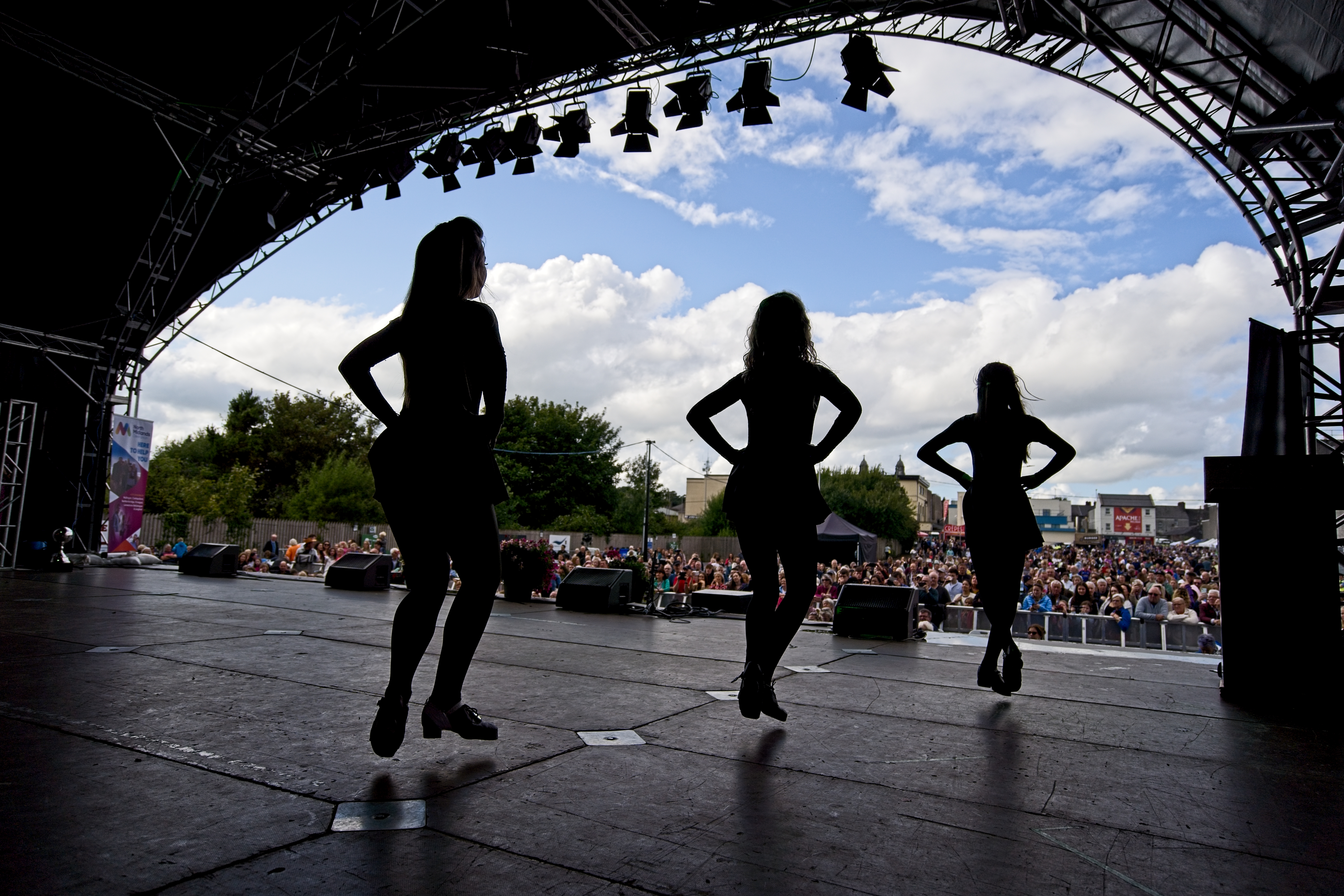 3 Irish dancers on stage