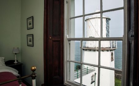 LEAD Blackhead Lighthouse_Desktop Ein Schlafzimmer in einem Leuchtturm mit wunderschöner Aussicht