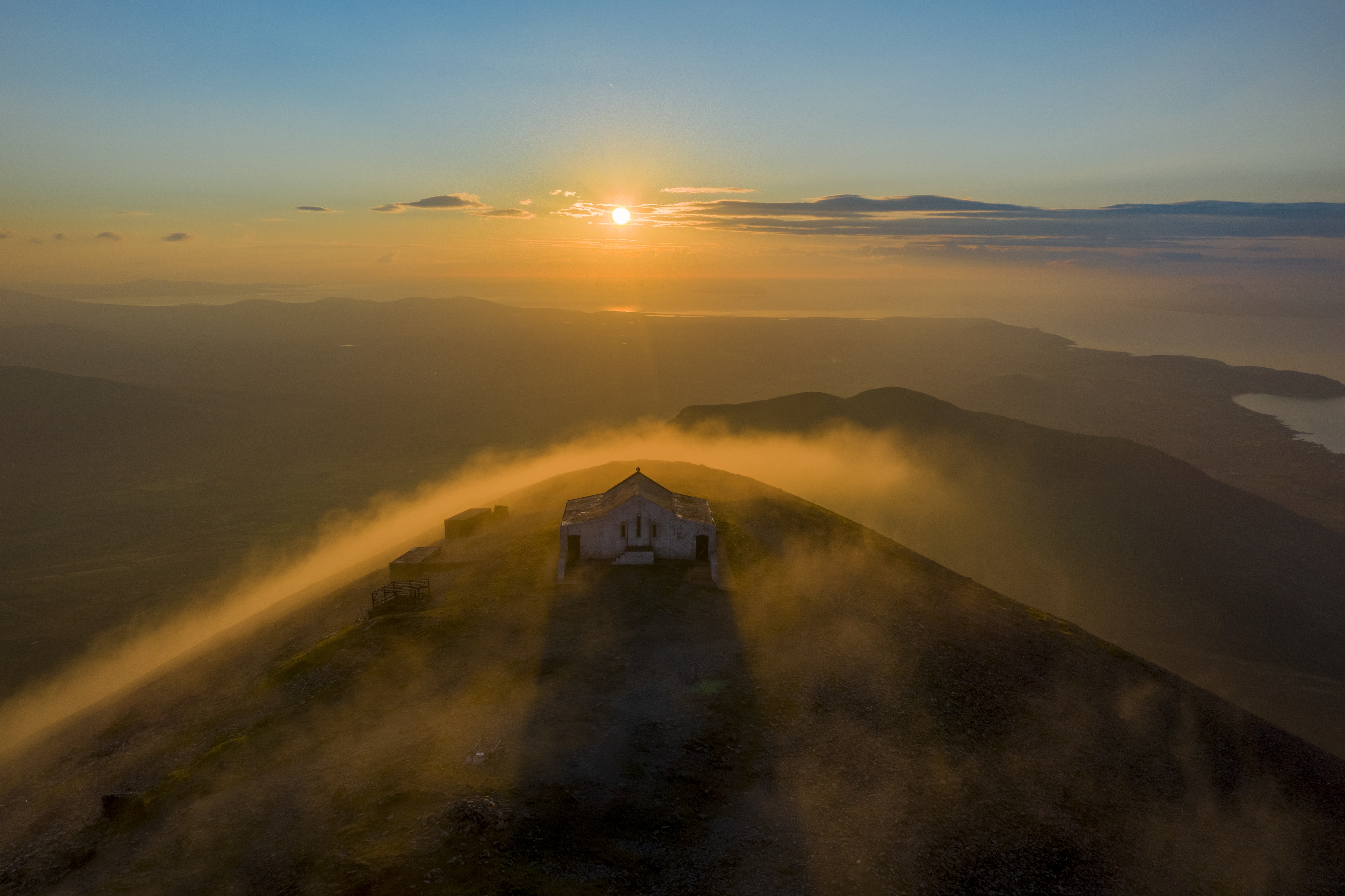 Summit of Croagh Patrick at sunset Co. Mayo Image of Summit of Croagh Patrick at sunset Co. Mayo