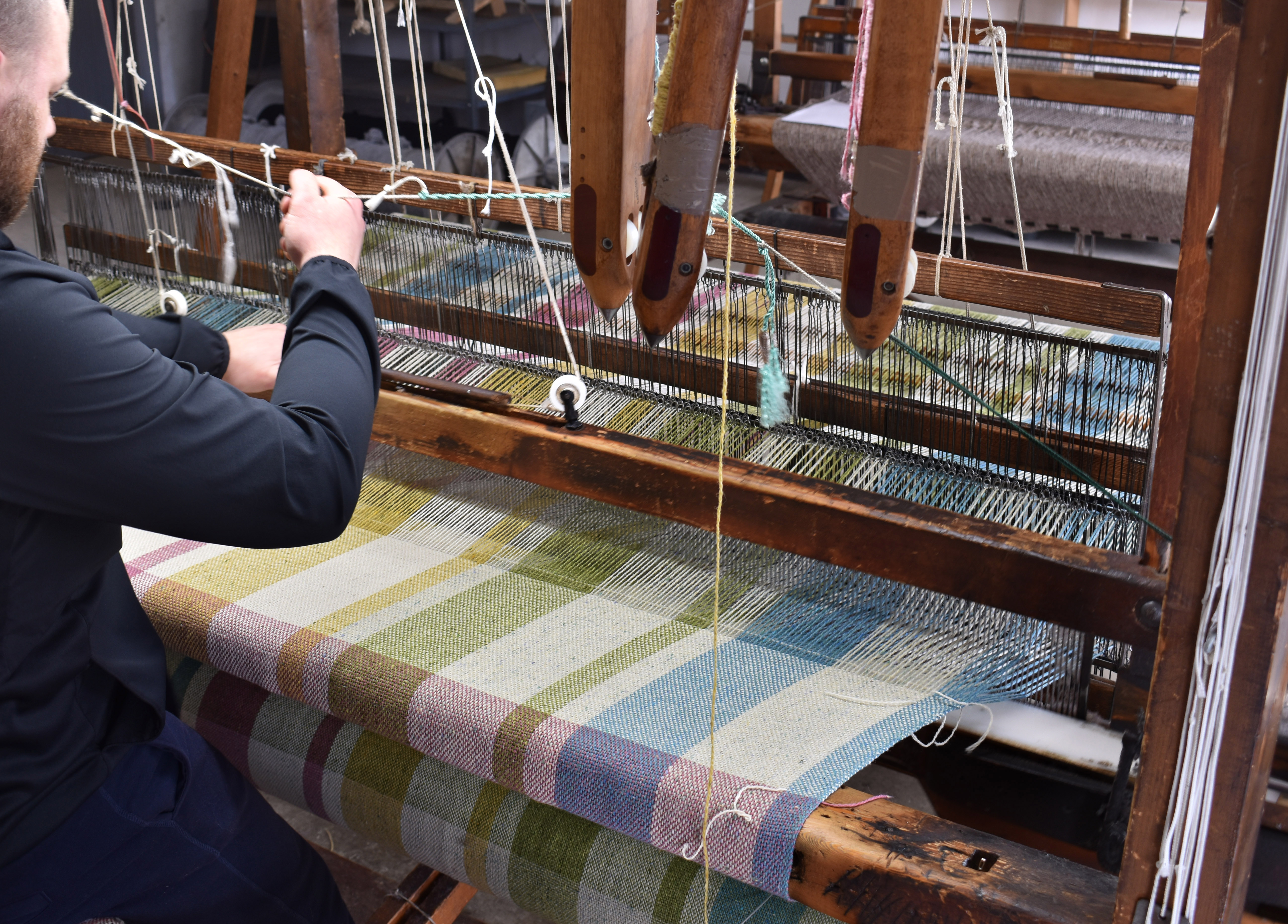 Image of Weaving fabric at Studio Donegal.
