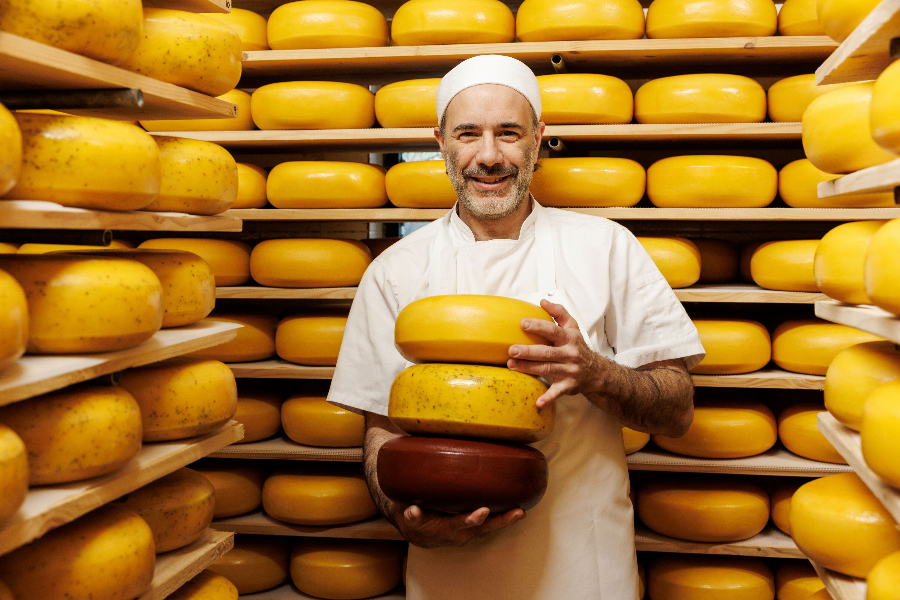 burren gold cheese cheesemaker in storeroom burren gold cheese cheesemaker in storeroom