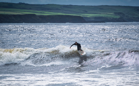 surfing the waves lahinch co clare